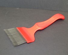 Red Wavy Fork for uncapping frames of honey