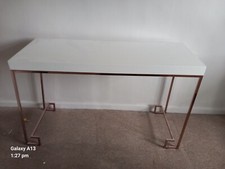 Allure Console Table. Rose gold square angled legs. 6 cm white gloss top.