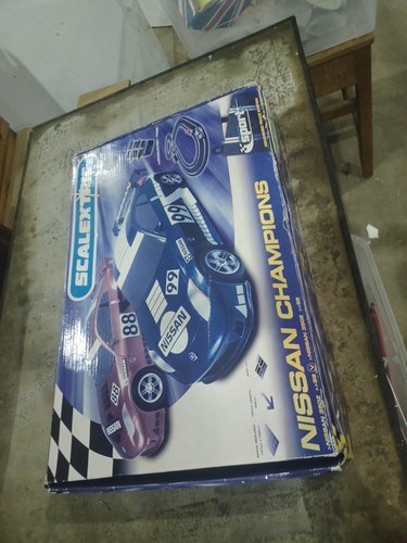 Scalextric nissan champions - scalextric,
