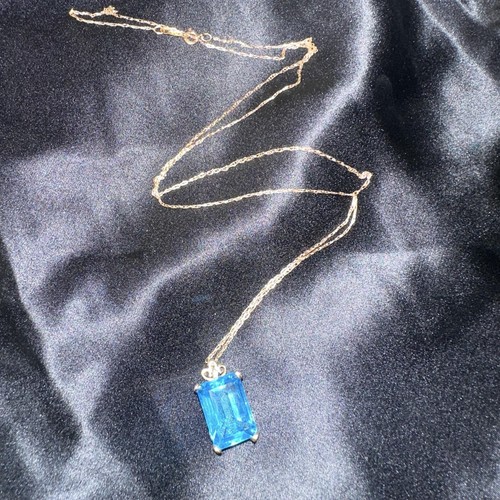10k gold swiss - swiss, topaz