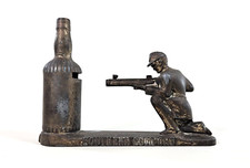 Vintage Cast Metal Money Box Southern Comfort Advertising,Hunter Firing Gun RARE