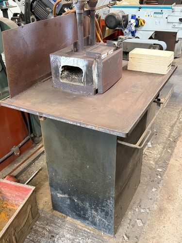 Twin burner gas forge floor