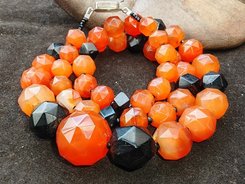 Whitby jet rose cut - jet, carnelian