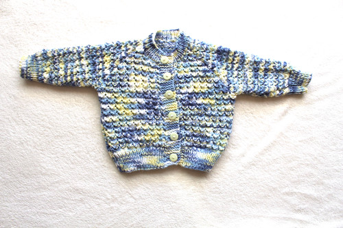 Hand knitted baby - hand,