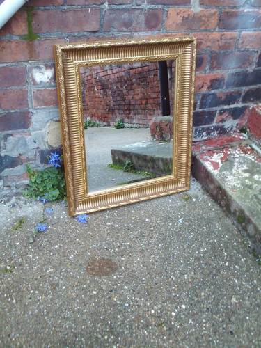 Ornate gold coloured bevelled