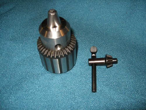Radial arm saw accessory chuck - arm,