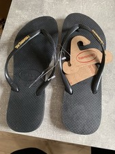 havaianas flip flops size 8 41/42 Black / Golden Logo Metallic