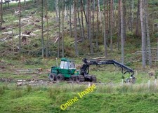 Photo 6x4 A logging machine at