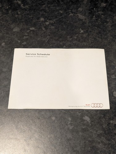 Stamped audi service book - service,