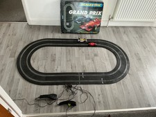SCALEXTRIC GRAND PRIX BOXED SET. CLEAN TRACK, TESTED AND IN GOOD WORKING ORDER 