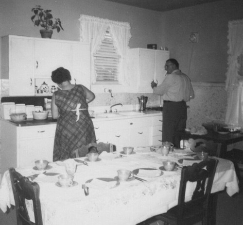 1950s couple preparing meal - couple,