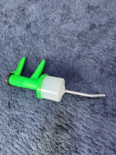 Plastic dose green - green, syringe