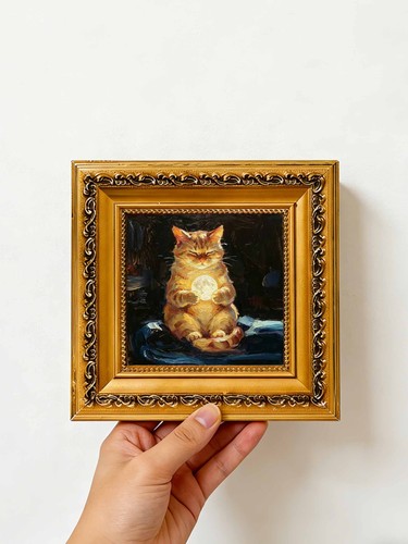 Chubby cat cradling moon - cradling,