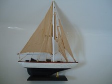 Model Yacht On Stand With Red