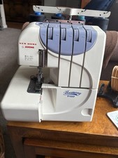 Janome Overlocker 9102D with Power Cable, Foot PedaI and Instruction Book/CD