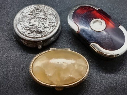 Three decorative vintage pill