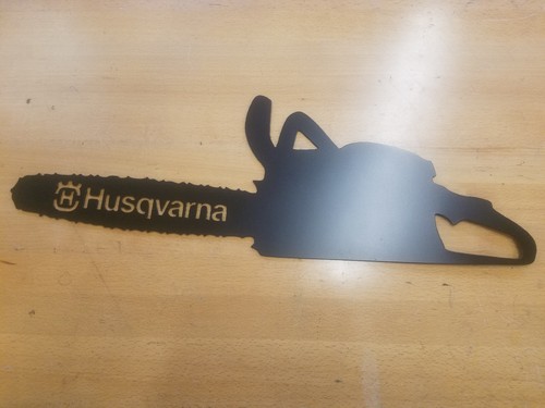 Husqvarna chainsaw metal - chainsaw, wall