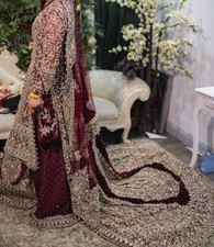 asian pakistani bridal wedding dress lengha with personalised potli bag 