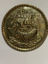 Antique Peerage Rare Brass Embossed Wall Plaque Depicting a Viking Longboat Egde