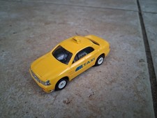 TOMY Tomica battery powered Yellow Taxi Car. Old style TOMY. Rare