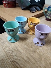 Set Of Four Funny Face Egg