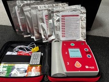 laerdal AED 2 trainer with 8 set of extra  teaching pads