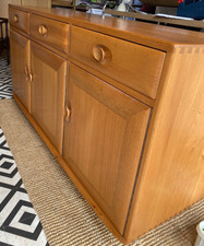 Ercol  Golden Dawn Windsor 3 Door High Sideboard. 136cm Length x 44cm wide. 60 h