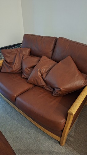 Ercol two seater leather sofa - two,