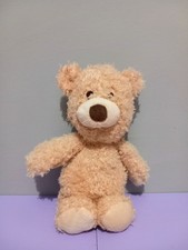 Small fluffy beige teddy - fluffy,
