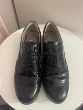 clarks black patent brogues