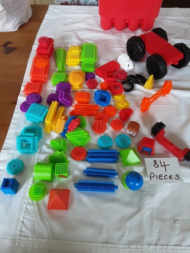Red bucket with pieces of - with, 84