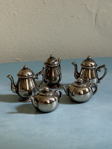 Set metal miniature dolls - 5,