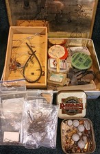 A Vintage Tins Containing A