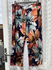 GORGEOUS SLINKY BOLD FLORAL PRINT CROPPED STRETCHY TROUSERS SZ 16 - 20 HOLIDAY
