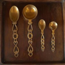 Set of 4 brass spoons