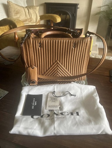 Coach tan light saddle rogue - -,