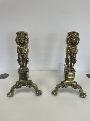 Pair antique brass fire - of,
