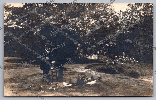Antique rppc man sitting - antique,