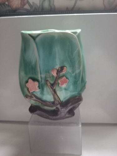 Turquoise vase with - with, pink