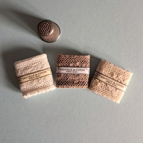 Three miniature bolts - three,