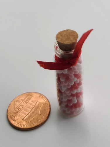 Miniature jar filled with - jar,