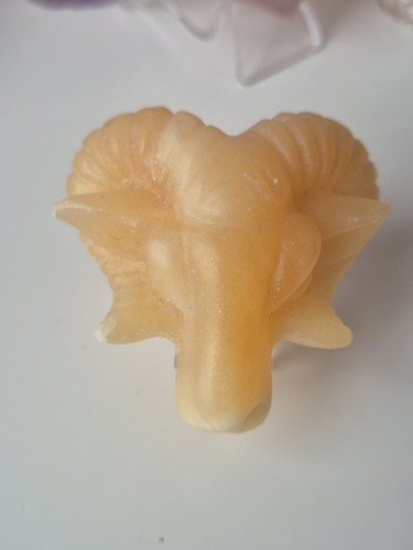 Honey calcite rams - calcite, head