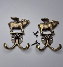 SET OF 2 BRASS FLYING PIGS