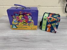 ELC MONSTER PUZZLE IN TIN &