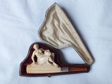 Meerschaum & amber, antique holder carved as a classical lady with a jug.