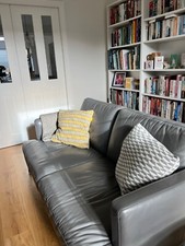 Grey leather Italian Natuzzi 2 seater sofa 