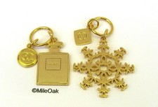 Chanel Gold Tone Key Charms  Set of 2 - 1 x Bottle & 1 x Snowflake New