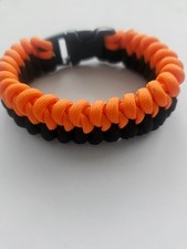 Mated snake side buckle