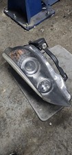 HELLA Xenon Headlight RHD BMW E60/E61 Left – OEM – 1LL 164 909-00