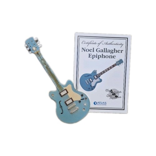 Miniature guitar oasis - :,